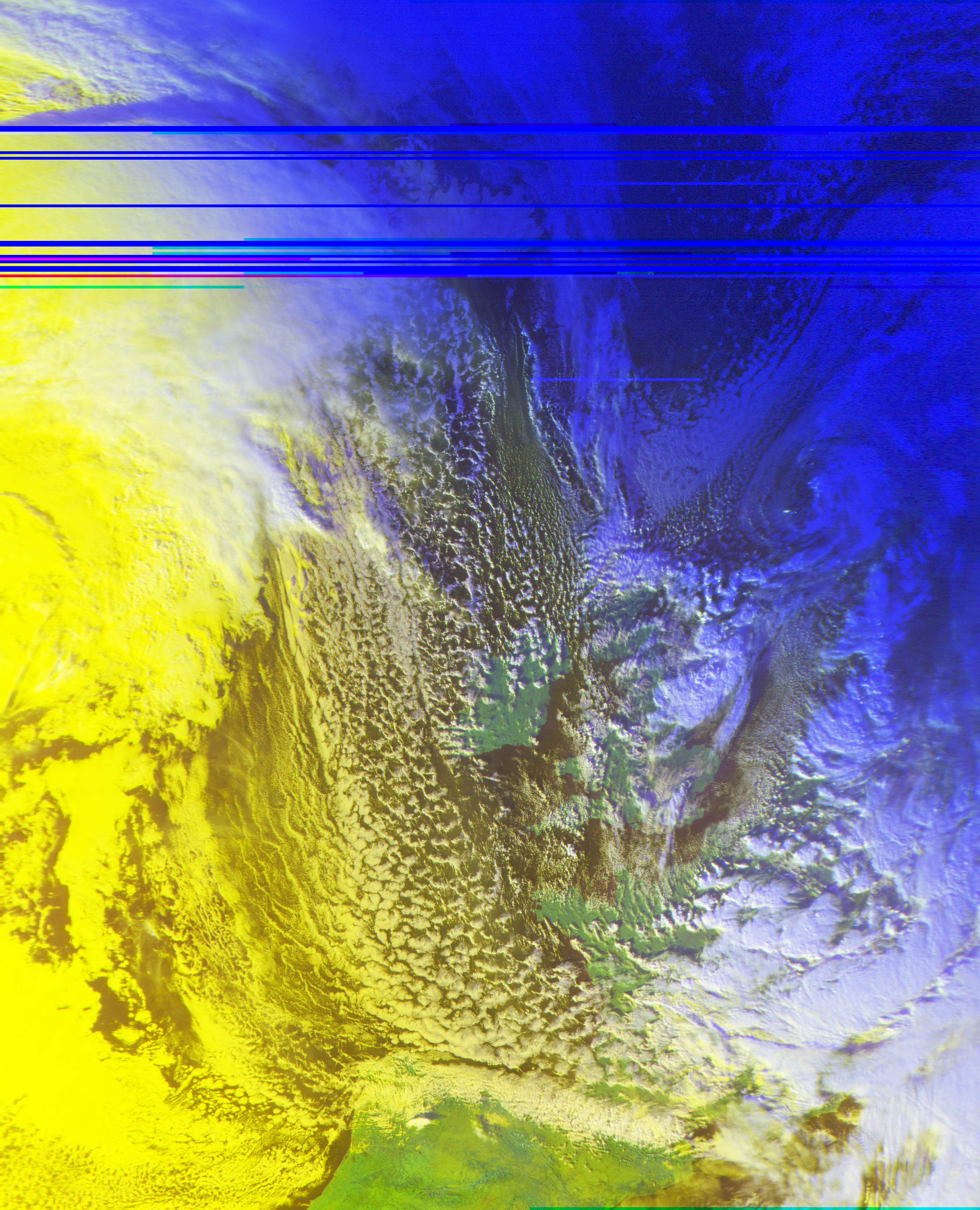 image of europe from space, partially covered in clouds. France, the UK, Ireland, and Spain are partially uncovered